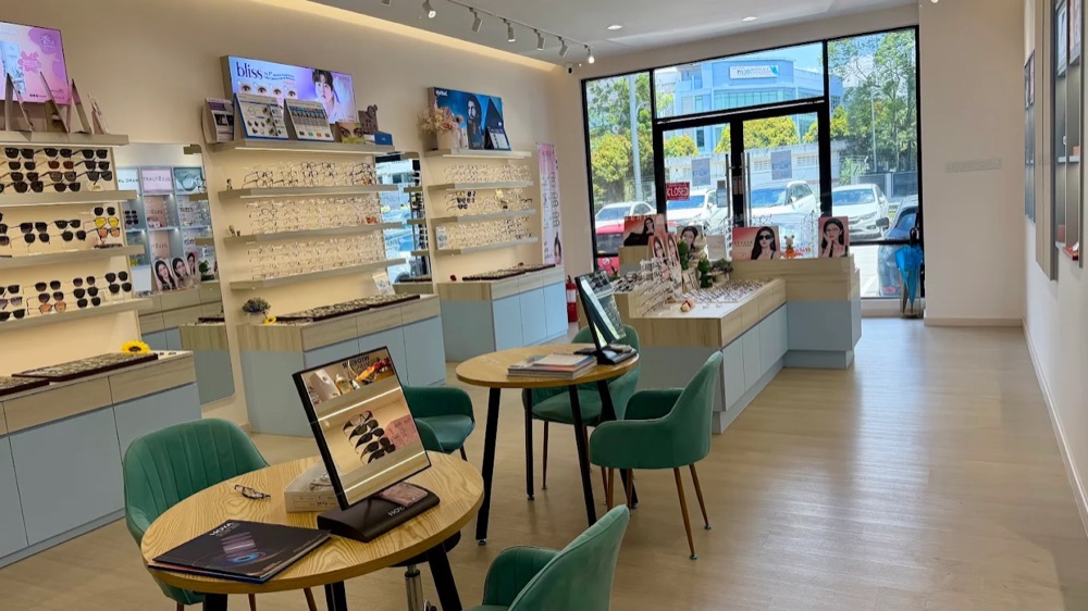 Customers browsing at Moment Optical